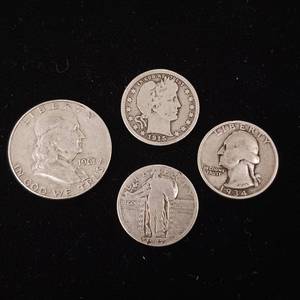 lot 379 image: Lot of 4 90% Silver Coins � Tax Exempt � Standing Liberty Quarter � 1934 Washington Quarter � Barber 1915 Quarter � 1961 Franklin Half Dollar