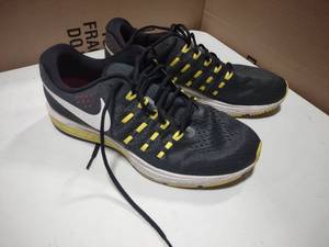 lot 110 image: Nike Air Zoom Vomero 11 running shoes size 12 grey and yellow