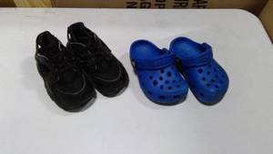 lot 82 image: Toddler black nikes and blue crocs size 6