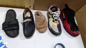 lot 83 image: Random single shoes R-Nike Comfort slide size 13, L-Ugg Fluff slide size 7, R-Clark Wallabee size 13, R-Nike LeBron 18 low Greedy size 13, R-Nike Air-Foamposite University Red size 13