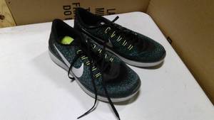 lot 104 image: Nike Free RN Distance running shoes size 12 black, volt and lagoon color scheme