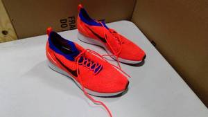 lot 107 image: Nike air zoom Mariah flyknit racer running shoes size 12 fluorescent orange