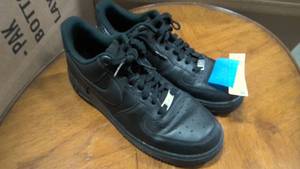 lot 58 image: Nike air force 1 07 black on black size 9