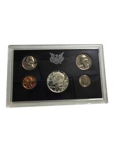 lot 11 image: 1969 Proof Set includes a silver half dollar, making it a valuable addition to your collection.