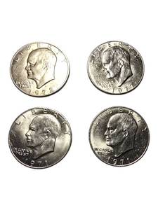 lot 18 image: Mixed Lot of Eisenhower Silver Dollars -Set of 4