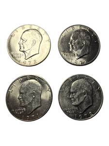 lot 21 image: Mixed Lot of Eisenhower Silver Dollars -Set of 4