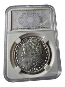 lot 40 image: Copy 1885 - CC Morgan - PCCB Professional Coin Display Slab. This is a very nice coin.