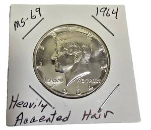 lot 61 image: 1964 John F. Kennedy Half Dollar, MS-69 grade, featuring the Heavy Accented Hair variant.