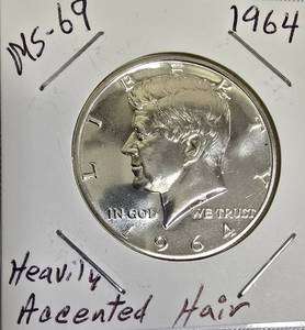 lot 65 image: 1964 John F. Kennedy Half Dollar, MS-69 grade, featuring the Heavy Accented Hair variant.