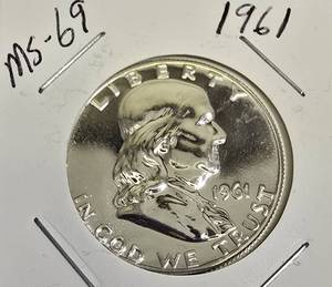lot 67 image: 1961 Franklin Half Dollar, graded MS-69