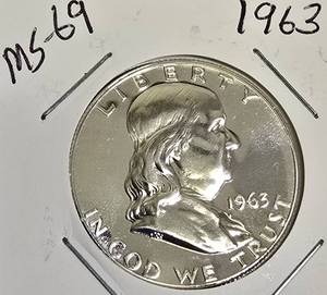lot 68 image: 1963 Franklin Half Dollar, graded MS-69
