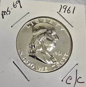 lot 70 image: 1961 Franklin Half Dollar, graded MS-69 ,CC