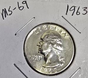 lot 79 image: 1961 George Washington Quarter - MS-69 grade.