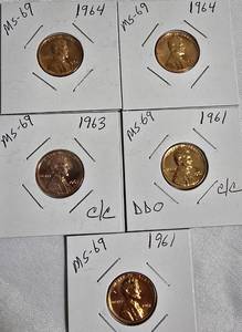 lot 94 image: Lot of 5 Pennies 1961, 1963 & 1964  with different grades and other defects. Please review below.