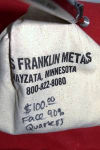 lot 566 image: 400 coins - $100 Face Value 90% Silver Coins NEVER OPENED - From MILES FRANKLIN in original Fabric Bag 71.5 Ounces total