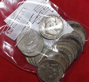 lot 571 image: Twenty (20) 90%  FRANKLIN Half Dollars