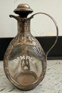 lot 93 image: Vintage Haigs DIMPLE Scotch  Whiskey Decanter Encased in Sterling Holder and Cap