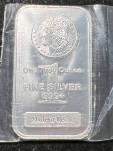 lot 18 image: 1 TROY OZ .999 FINE SILVER MORGAN DOLLAR DESIGNED BAR