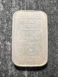 lot 24 image: 1 TROY OZ .999 FINE SILVER ASSAY BAR