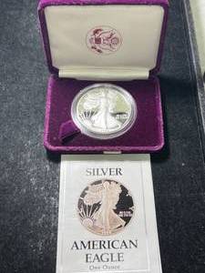 lot 67 image: 1988 PROOF AMERICAN SILVER EAGLE IN ORIGINAL MINT BOX