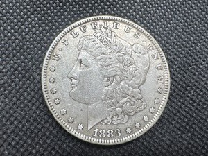 lot 21 image: 1883 Morgan Silver Dollar