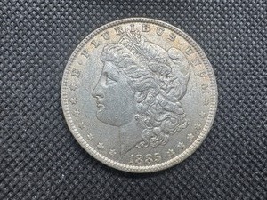 lot 28 image: 1885 Morgan Silver Dollar