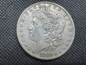 lot 31 image: 1886-O Morgan Silver Dollar