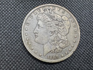 lot 38 image: 1889-O Morgan Silver Dollar