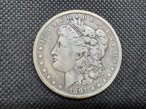 lot 43 image: 1891-O Morgan Silver Dollar