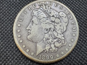 lot 46 image: 1899-O Morgan Silver Dollar