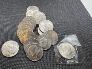lot 59 image: Twenty Four Clad Kennedy Half Dollars 1972 1973 (2) 1974 1977 1984 and 18 Bicentennial 1976s