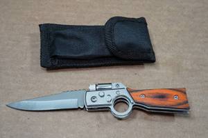 lot 115 image: Rifle Style Folding Knife