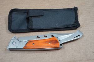 lot 128 image: Stainless Steel Folding Knife