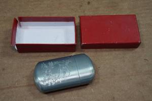 lot 166 image: Zippo Lighter Case and Long Gun Keychain