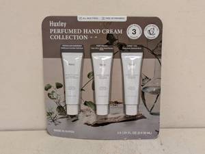lot 86 image: NEW HUXLEY PERFUME AND CREAM COLLECTION 3PK.