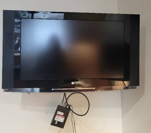 lot 5 image: LG 32-Inch Wall-Mounted TV with Mount