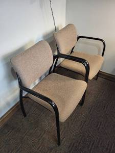 lot 6 image: Herman Miller Chairs - Beige Upholstered Visitor Chairs, Black Frames - Lot of 2