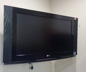 lot 28 image: LG 32-inch TV - Wall Mount Included