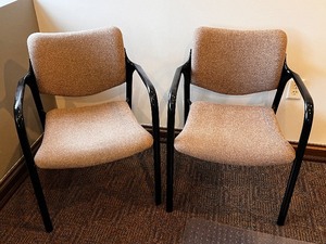 lot 93 image: Herman Miller Upholstered Armchairs Pair - Black Frames, Beige Speckled Fabric