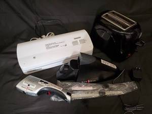 lot 45 image: FoodSaver Vac 1050 Vacuum Sealer with Sonic Blade Attachments & User Guide