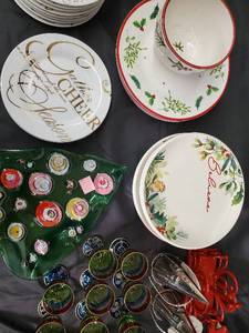 lot 63 image: Christmas Dinnerware Set - Assorted Plates, Mugs, Goblets & Decor (BelieveCookies for Santa)
