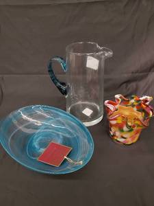 lot 71 image: Art Glass Trio Clear Pitcher with Blue Handle, Turquoise Bowl, Rainbow-Ruffled Vase