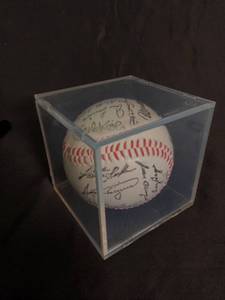 lot 74 image: Autographed Baseball in Clear Acrylic Display Cube - Multi-Signature including Kirby Puckett MLB Collectible Ball