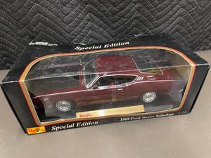 lot 45 image: Maisto 1969 Ford Torino Talladega Special Edition 118 Scale Die-Cast