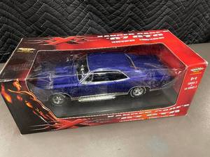 lot 47 image: Xander Cages 1967 GTO - 118 Die-Cast Car by American Muscle