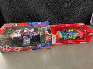 lot 56 image: Racing Champions War Paint 123 Die-Cast NASCAR Stock Cars - Valvoline #6 & DuPont #24 (Lot of 2)