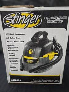 lot 55 image: Stinger 2 12 Gallon WetDry Vac.