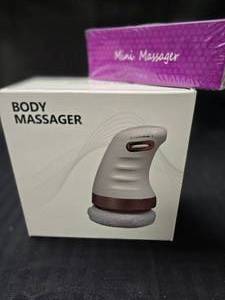 lot 121 image: New Body Massager and Mini Massager
