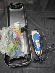 lot 133 image: Wahl Home Haircutting Shaver with Combs