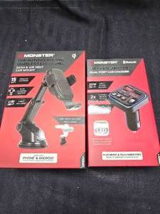 lot 213 image: Monster Auto Clamping Wireless Charger and FM TransmitterCharger